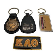 Lote de llaveros vintage Eagle Phillips 66 GMC Cadillac concesionario latón KAO publicidad