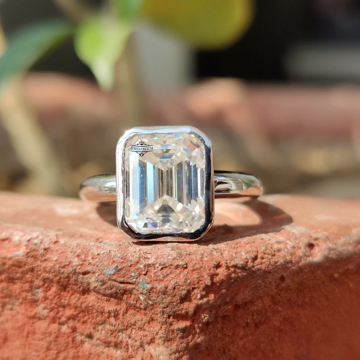 Moissanite emerald cut solitaire deals