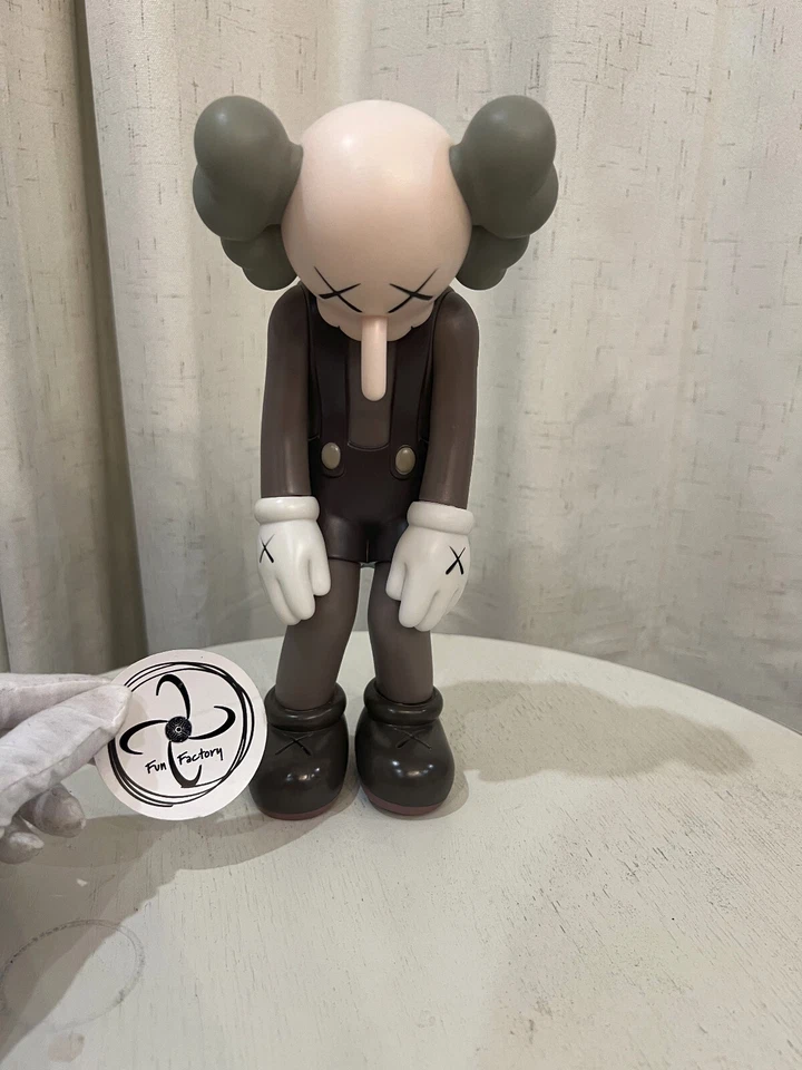 Figura Vinilo KAWS Small Lie Companion Marrón Foto 3 de 4