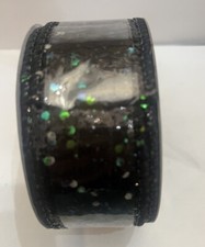 1 1/2  x 30 Ft wired edge ribbon. Black Sequins. Glow In The Dark. Halloween