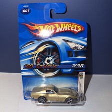HOT WHEELS 1/64 DIECAST CAR 69 CORVETTE STINGRAY GOLD ©2005 ISSUE