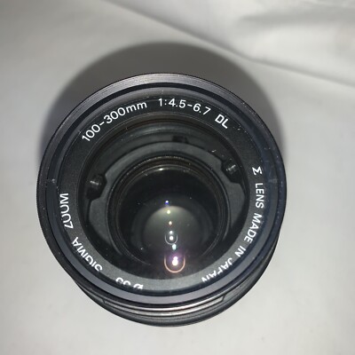 Sigma 100-300mm f/4.5-6.7 DL Telephoto Lens For Minolta AF   With Hood Mount