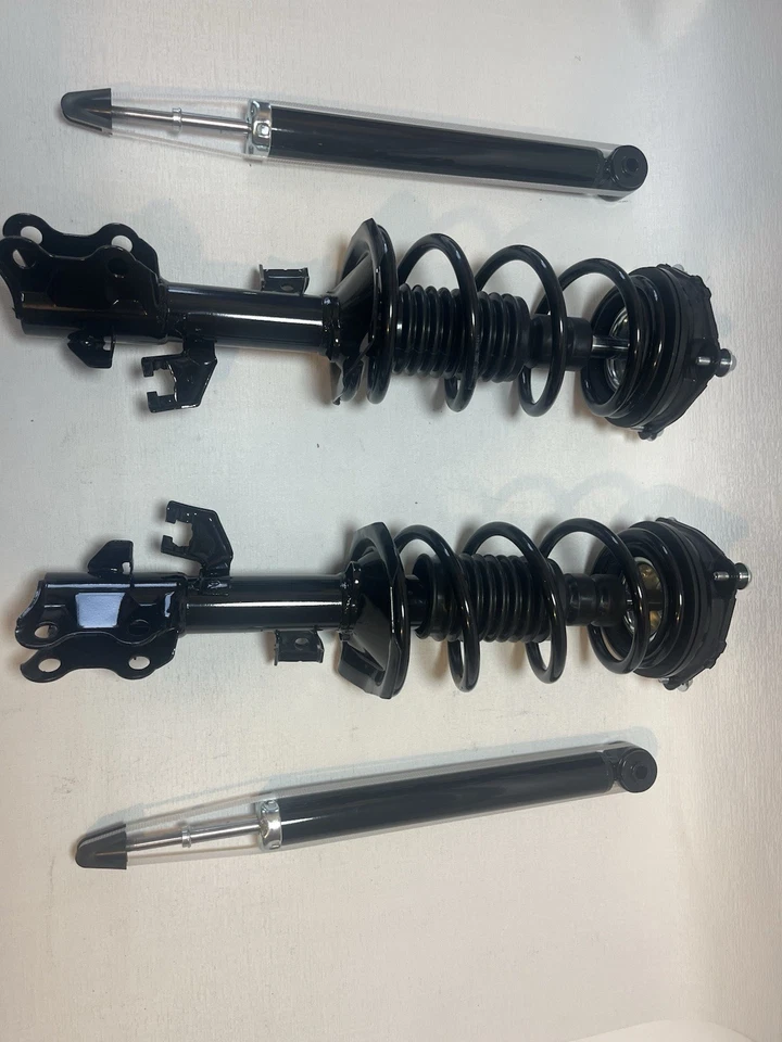 Juego completo de puntales delanteros y amortiguadores traseros redondos automáticos Nissan Versa 2007-2012 Foto 2 de 4