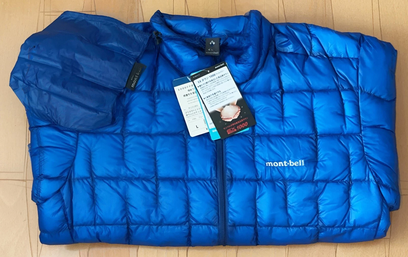 Montbell Plasma 1000 Down Jacket Men's Lightweight Black Lite Gray Red Blue
Opens in a new window or