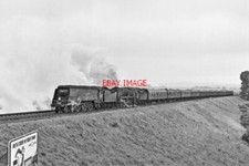 PHOTO SR WEST COUNTRY LOCO NO 34102 AND ANOTHER BINCOME 1966 OR 1967