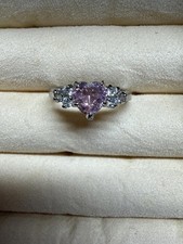 Silver Ring with Heart-Shaped Pink Stone and Clear Accent Stones