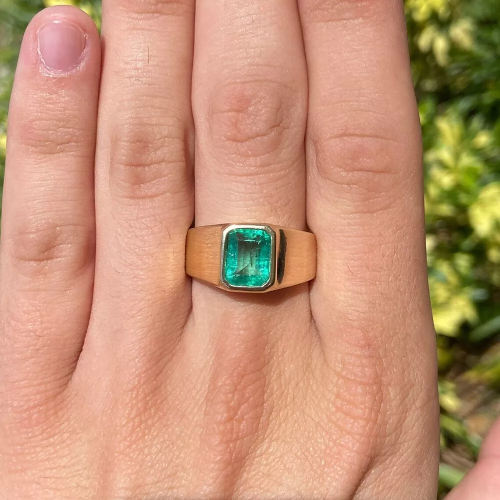 Solid emerald best sale ring
