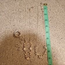  2 Claire's rhinestone necklaces with flowers. 2 sets of earrings