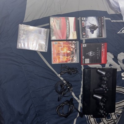 Sony PlayStation 3 Super Slim - 500 GB - Black Console+ 2 Controller And 5 Games
