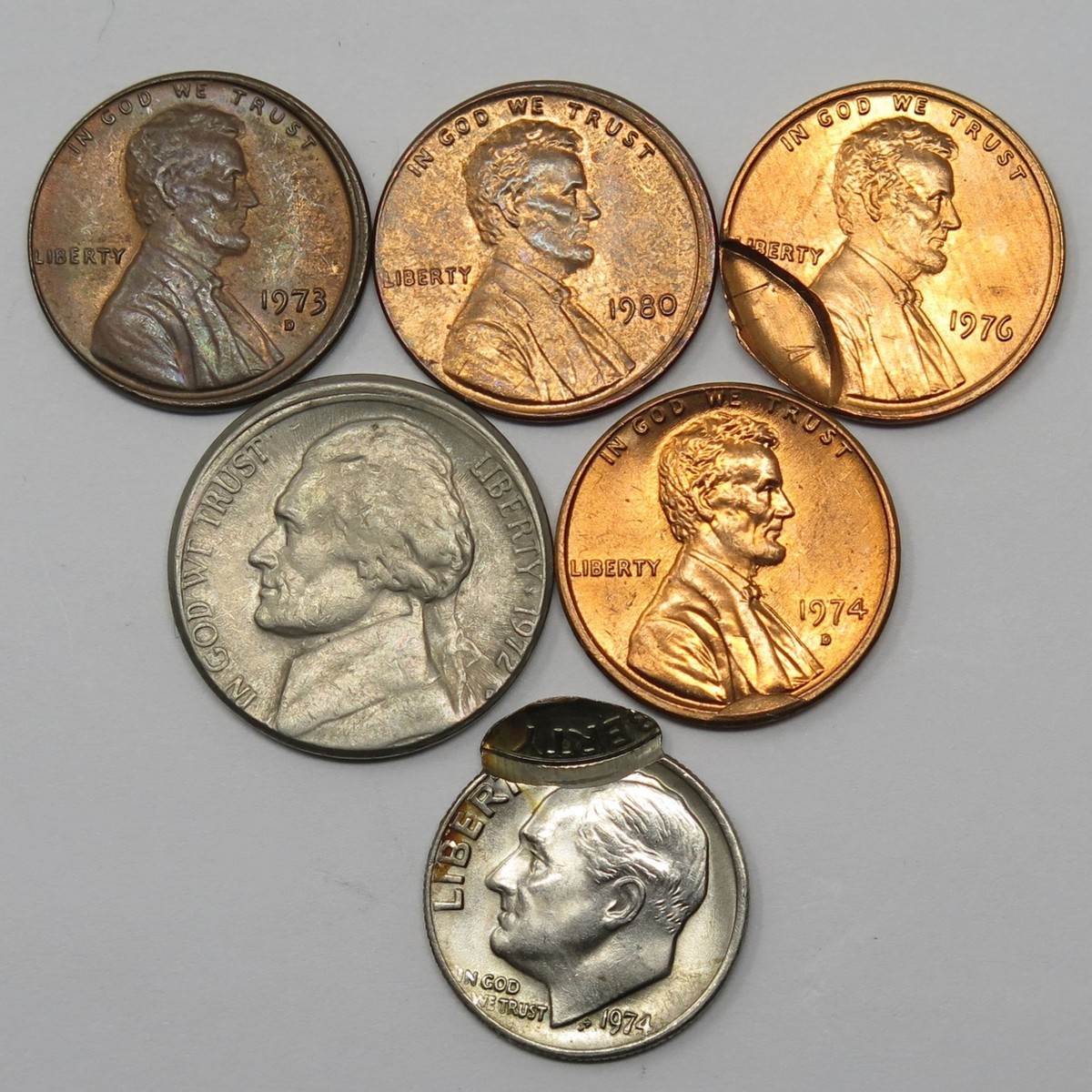 6x Assorted US Mint Errors - 3x M.A.D, 1x CUD, 1x Partial Brockage, 1x Over  Stri