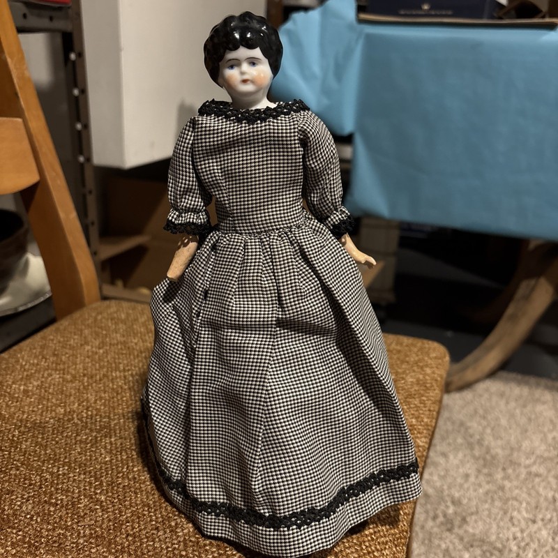 Antique China Head Doll Approx. 10 Inches With Doll Stand And Cloth Body