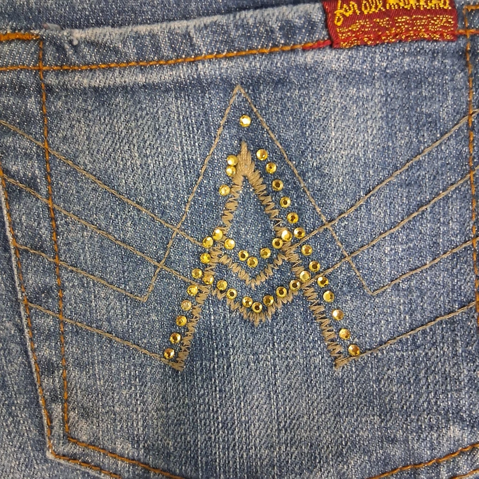 Pantalones de mezclilla Seven for All Mankind tiro bajo para mujer talla 27 A bolsillo acampanado lavado medio Foto 4 de 4