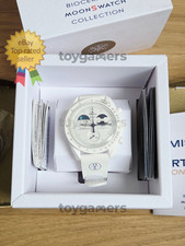 Swatch Mission to Earthphase - Orologio Snoopy Luna Bianca Oro Luminoso di Luna Nuovo