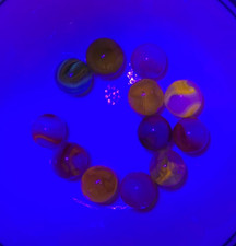 Lot of 12 Assorted Cadmium Swirl Marbles UV Reactive Cadmium Glass