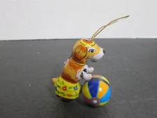 VTG ZZ Germany Dog Ornament With Ball Metal Tin Toy Height 3in Tall
