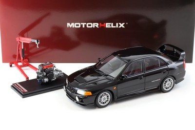 1:18 Motorhelix Mitsubishi Lancer EVO 4 IV Pyreness black 1999 with engine M8400
