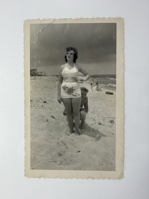 FOUND PHOTO Busty Woman in Swimsuit On Beach In Sunglasses Man Hiding 1950 s
