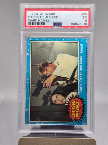 1977 Topps Star Wars #65 Carrie Fisher and Mark Hamill — PSA 5