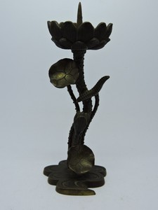 Chinese Bronze lotus stem and flower candlestick holder.