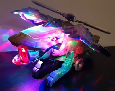 Transformers Spray Dinosaurier Elektro Hubschrauber Bump & Go Sounds Spielzeug Mädchen Jungen