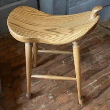 Antique Oak Saddle Stool: Timeless Elegance for Classic Interiors