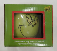 New Dr. Seuss The Grinch Merry Grinchmas 14 Oz. Oval Ceramic Mug Sock Combo