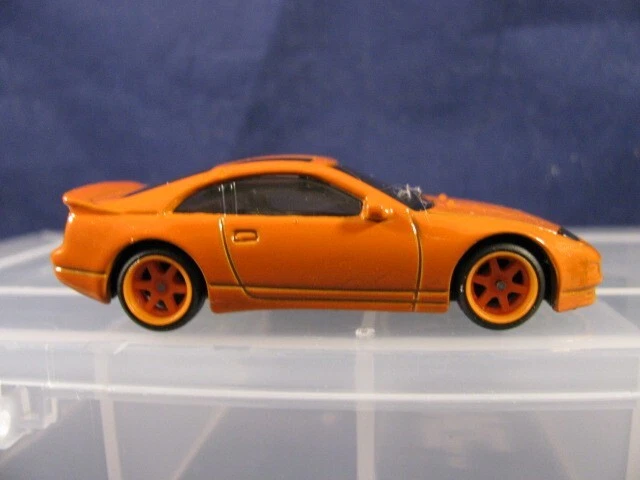 Nissan Serie 300ZX 2024 Hot Wheels Twin Turbo Naranja - con cambio de rueda de pilotos reales Foto 2 de 4