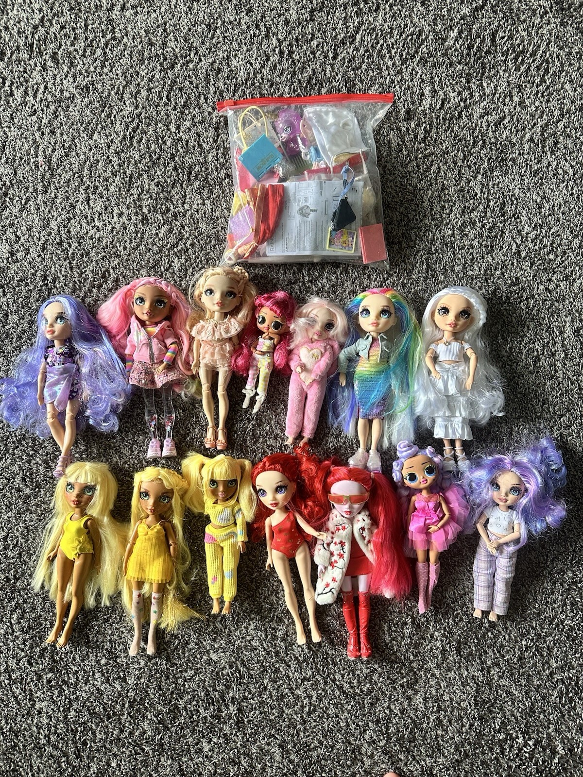 Rainbow High 12 Dolls with Accessories and 2 Bonus LOL Dolls