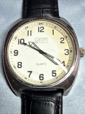 Eton quartz watch with a black leather strap.
