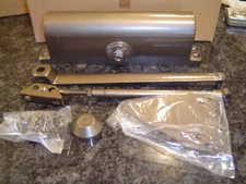 NEW INTERNATIONAL DOOR CLOSERS MODEL 55P  CHARCOAL SURFACE CLOSER
