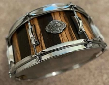 Daville (Doc Sweeney) Zebrawood/Wenge 14x6 stave snare, satin oil, Canopus wires