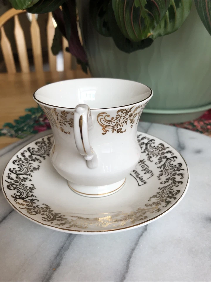 Taza y platillo de porcelana dorada feliz aniversario Itsm W Foto 4 de 4