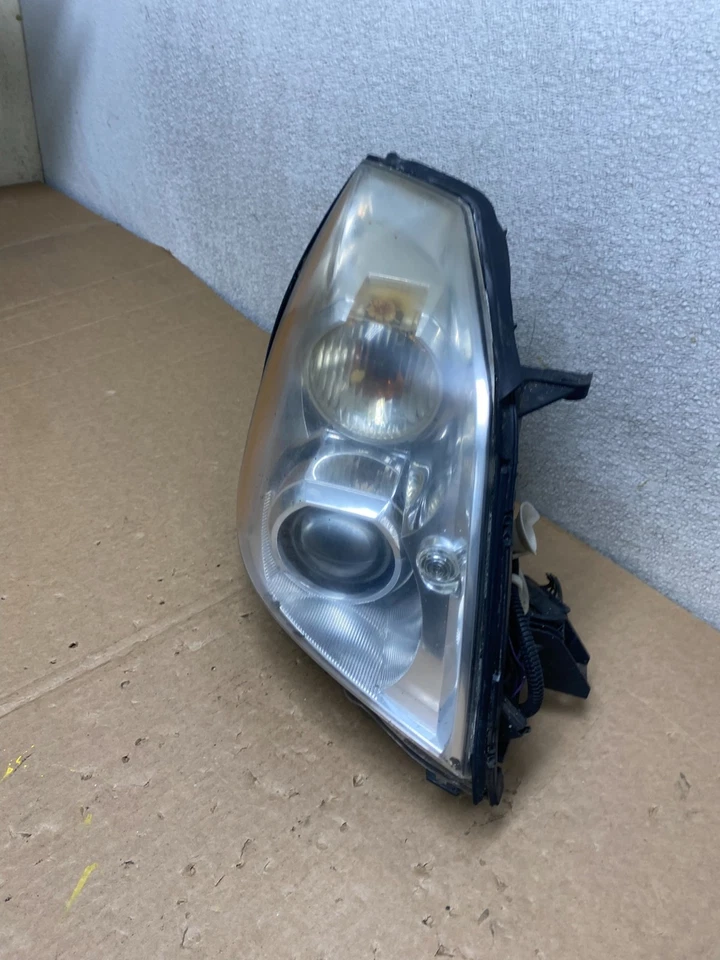 Faro oculto de xenón lateral derecho pasajero Cadillac DTS 2006-2011 OEM U9828 Foto 2 de 4