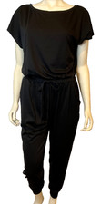 Black Knit Jumpsuit Round Neck Short Sleeve Drawstring Waist Front Pockets Sz L