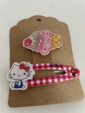 Hello Kitty Hair Clips 3.00 For One card at random