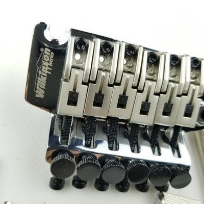 Wilkinson 6-string electric guitar with dual-lock tremolo system bridge