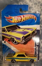 Hot Wheels 2011 Street Beasts '65 Pontiac GTO Yellow Car  NEW 