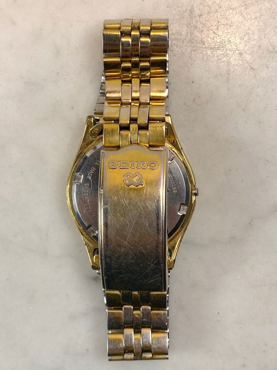 Vintage SEIKO SQ Men's Day Date Watch. Gold Tone Oyster Case Vintage SEIKO SQ Men's Day Date Watch. Gold Tone Oyster Case
