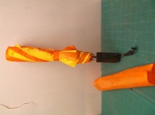 UNCF orange and yellow umbrella