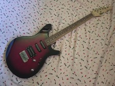 Rogue RR100 Rocketeer Red Solid Body Electric Guitar  10 Watt Amp