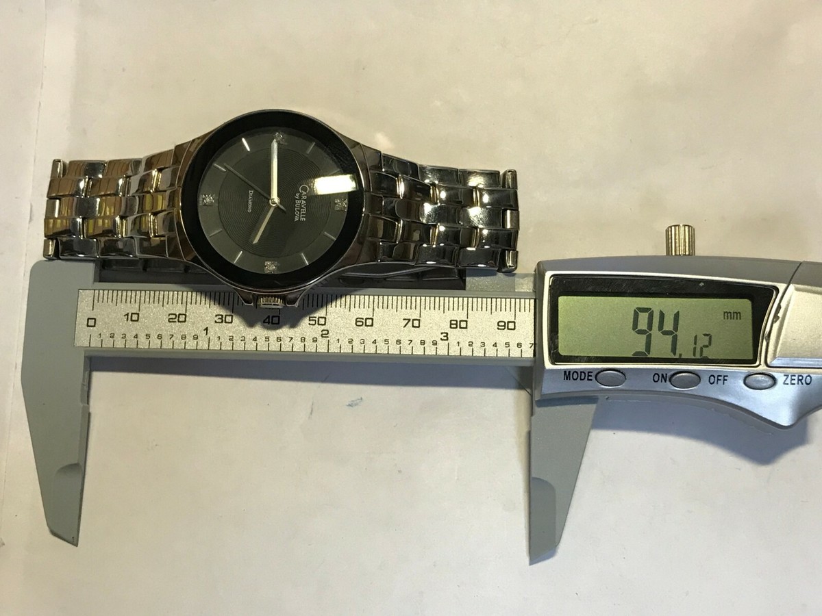 Men's Caravelle By Bulova Black Face Diamond Dial Watch