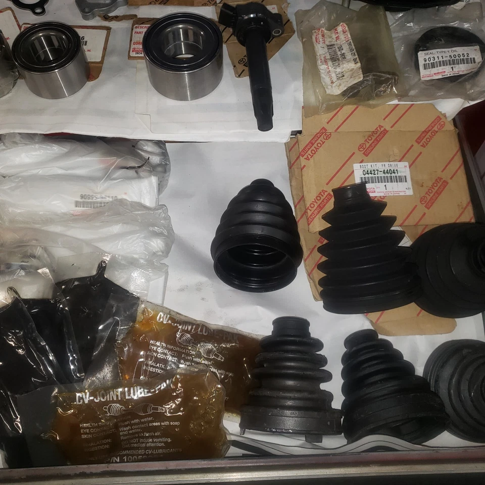 new factory toyota parts waterpump,bearings,coil,boot kits,hubs,tensioner,lot - Image 2 of 4