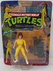 Teenage Mutant Ninja Turtles April O'Neil 10 back 1988 Playmates action figure