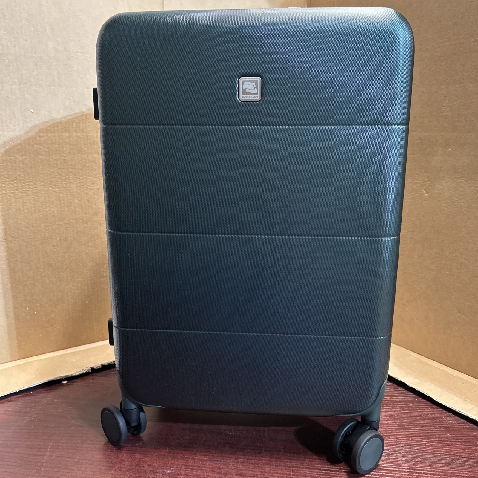 HANKE CARRY ON LUGGAGE 20IN SPINNER WHEELS HARD SHELL BLACKISH GREEN NEW!!-image