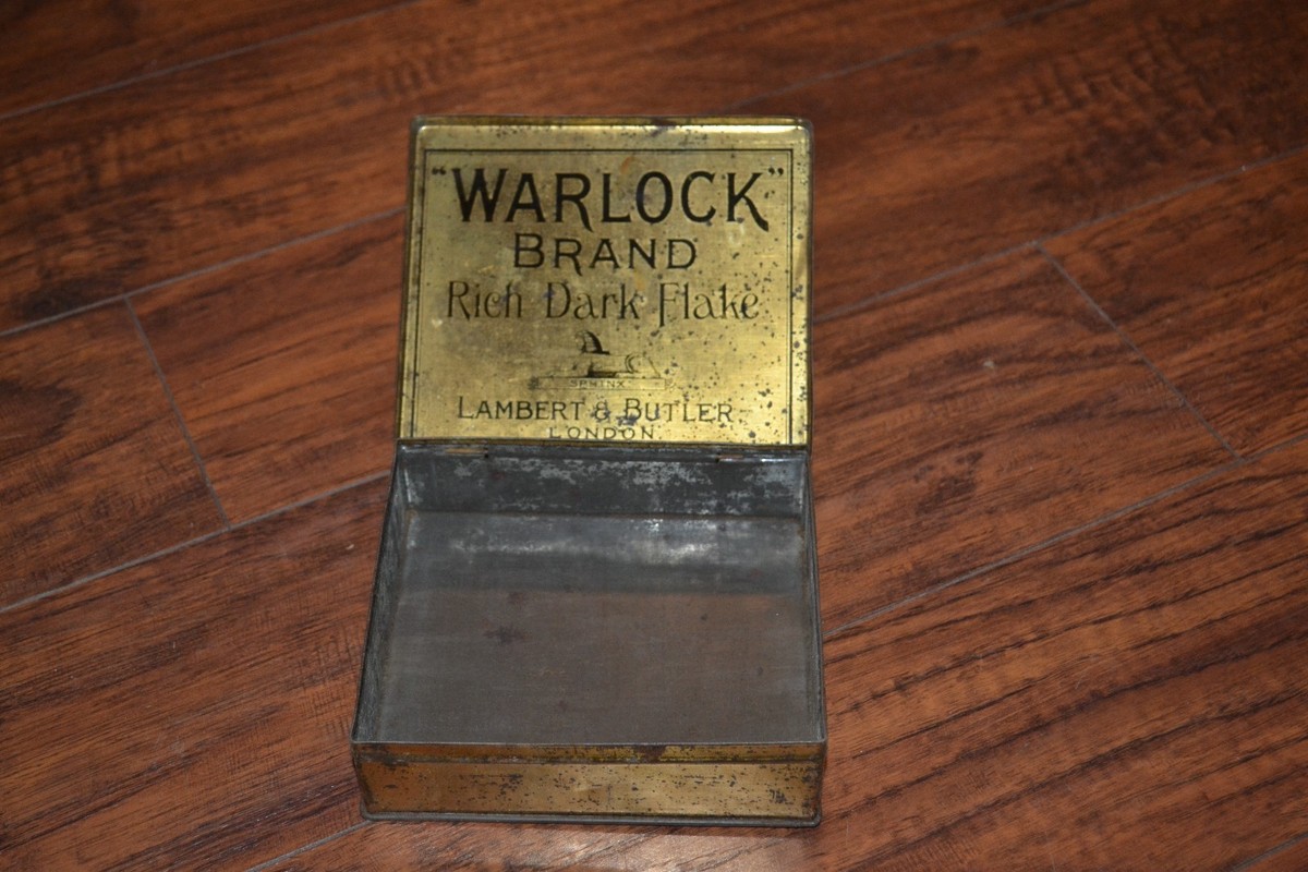 D14- Warlock Brand Rich Dark Flake Tobacco Tin