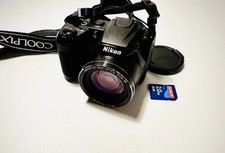 Nikon L310 Digital Camera - 14.1 MP, 21x zoom, 23K dots LCD, Immaculate, with SD