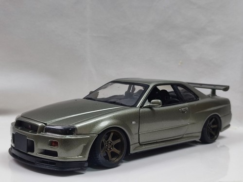 Motormax 1/18 Nissan Skyline R34 GTR Millennium Jade modificado a medida - Imagen 11 de 12
