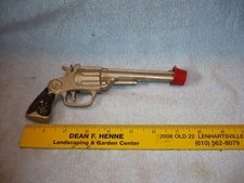 circa 1935 by dent   Cast Iron  Pistol single shot