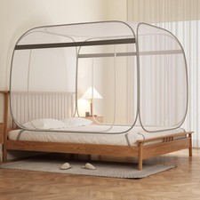 Portable folding mosquito net tent with a wide top and a foldable bottom.