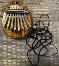 Kalimba 8 Key Wood Mini Thumb Piano Finger  Oval 3x 2 inches. new